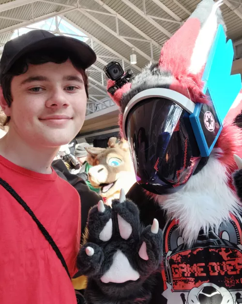 ComicCon was today, and I met some fellow furry friends! by Portuzil