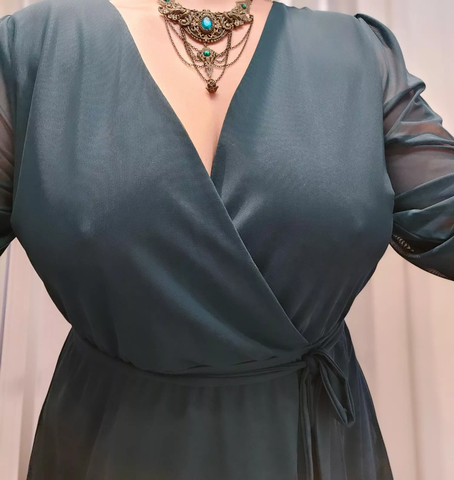 Chiffon emerald dress with some pokies on the side  posted by RichProtectionlove