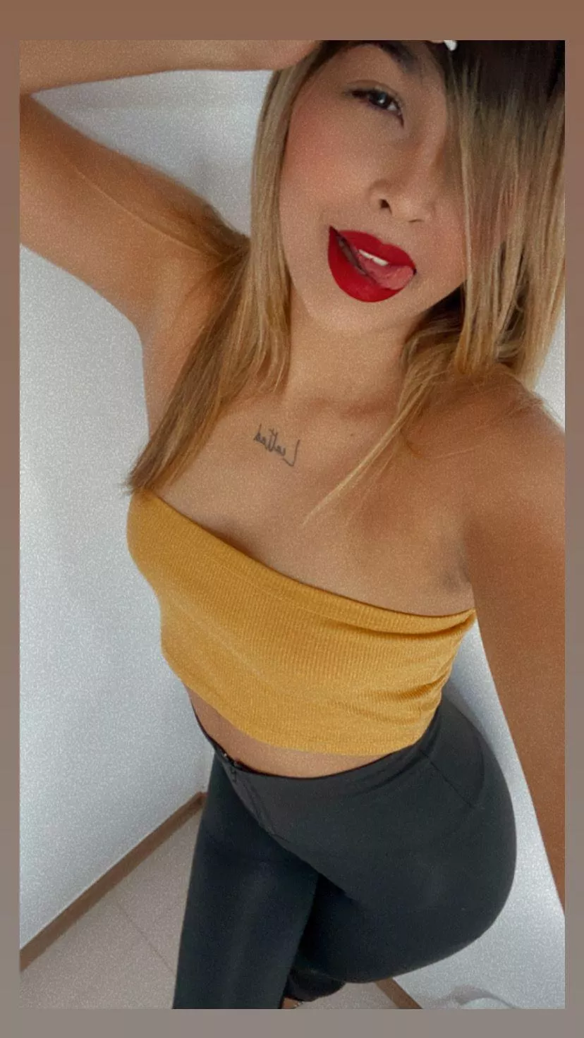 DO I look like a cheap slutty latina with red lipstick? posted by lexxynatpup