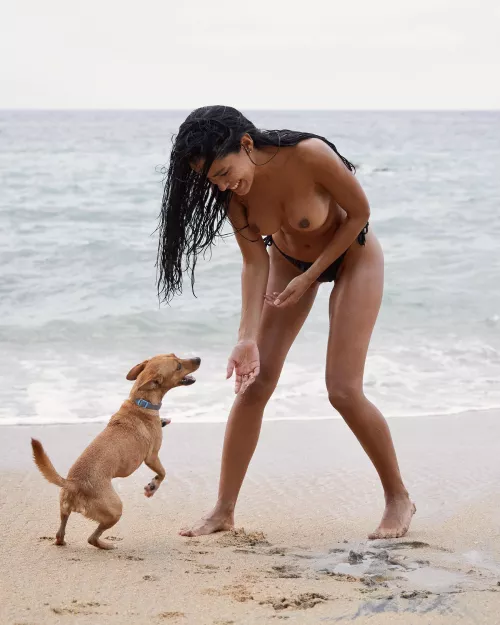 Ashy playing on the beach by ashydeluca