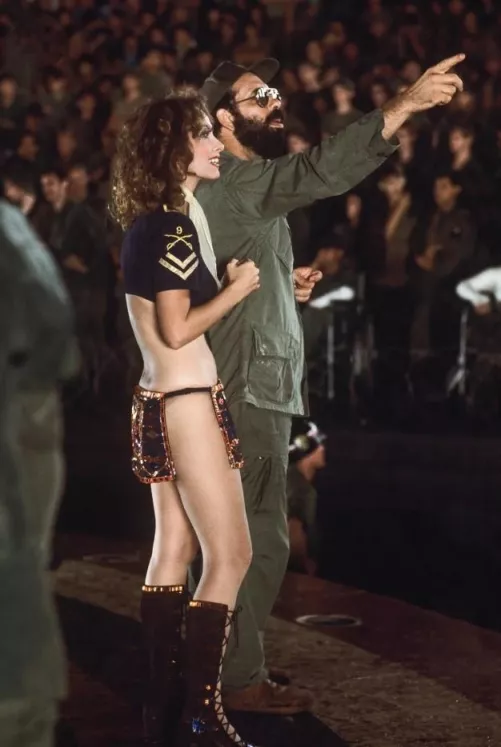 Francis Ford Coppola and playmate Linda Beatty on the set of Apocalypse Now (between 1975-79) by UncleSquiffy