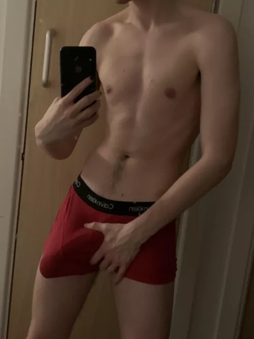 Is red my colour? by Bulgedlad