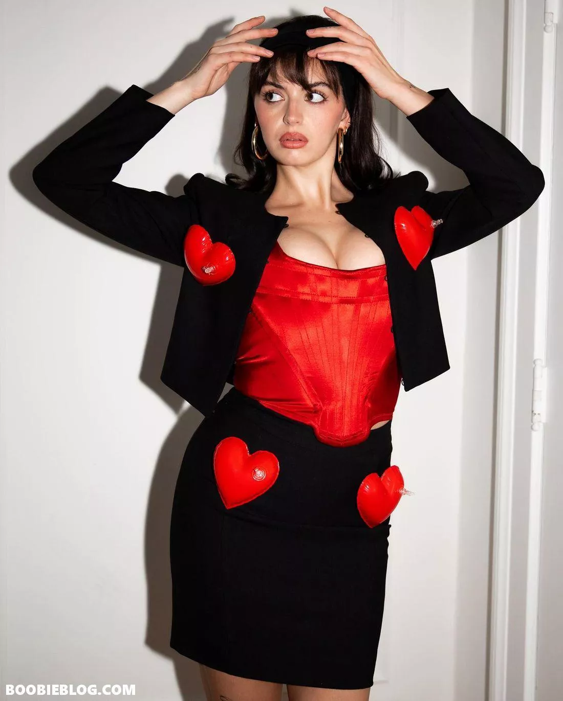 Rebecca Black Cleavage in a Red Corset! posted by RightSideUpTurtle