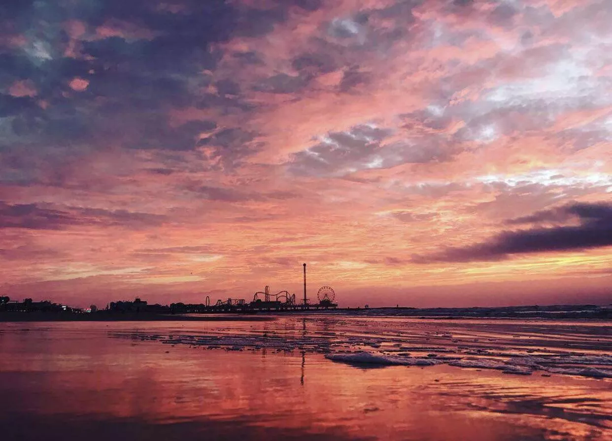 Stunning sunrise at Galveston beach Texas posted by B_Bunnyyyy