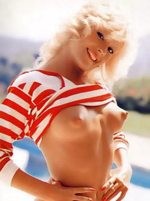 Perky and puffy. A vintage blonde flashing a smile and some nipples. by Extreme-Parfait8266