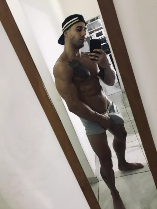 Do you like how the cap fits me? by TattooedMuscled