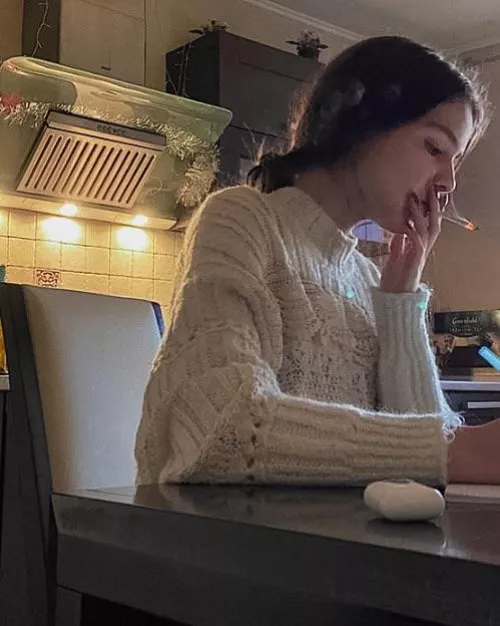 Whenever her roommates leave, Amy lights a cigarette and smokes while doing her homework  by darkpoetries