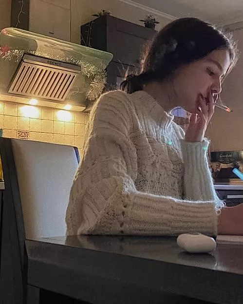 Whenever her roommates leave, Amy lights a cigarette and smokes while doing her homework  posted by darkpoetries