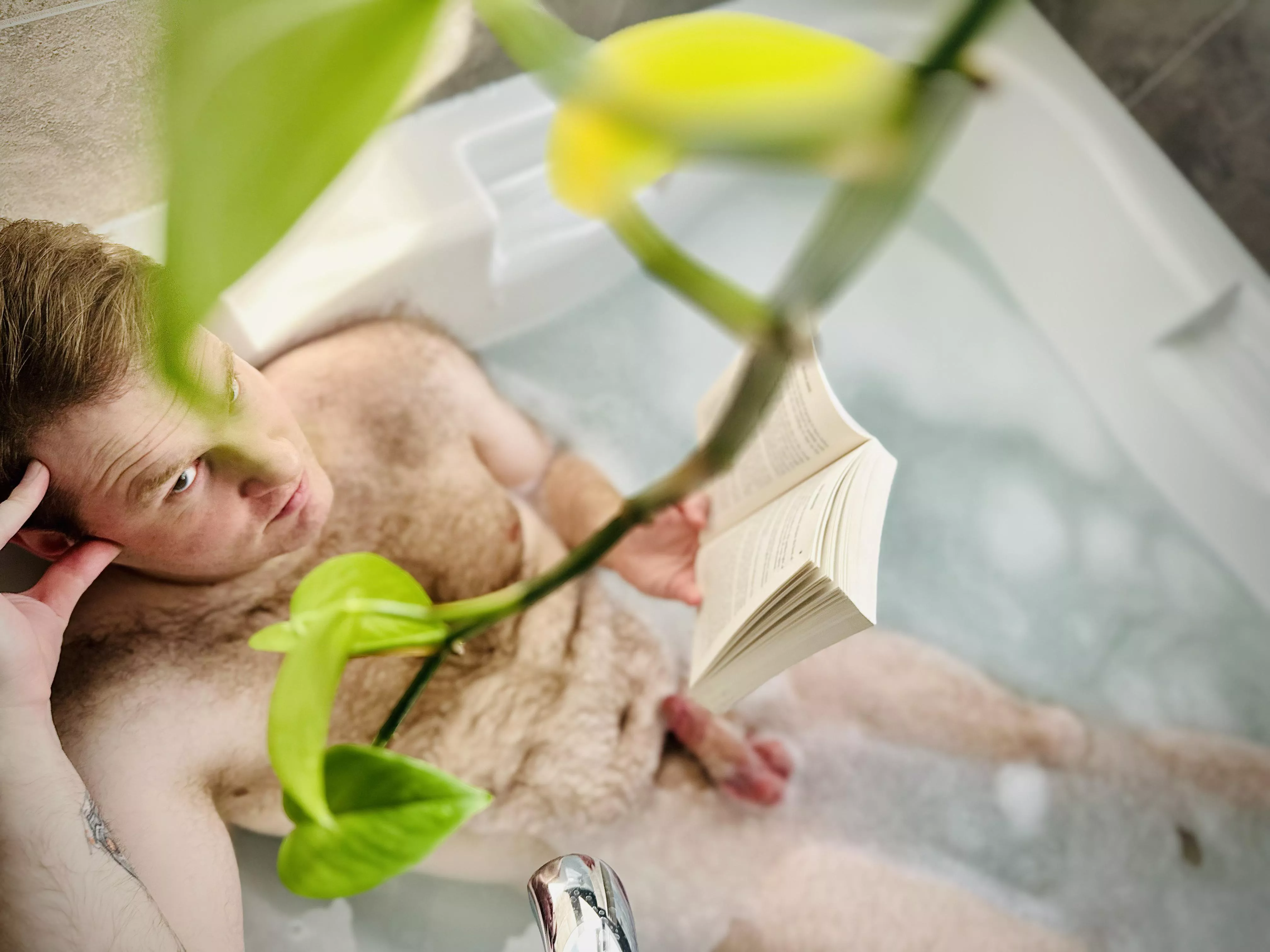 Lazy day reading in the tub posted by zaphods_third_head