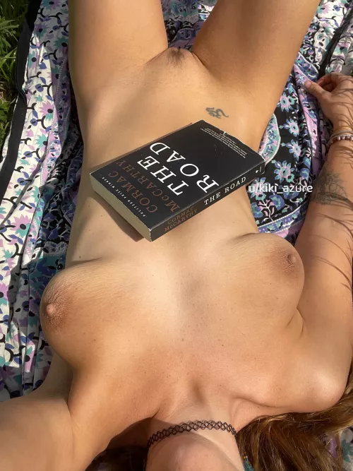 All I need is a good book and sunshine on my nude body by kiki_azure