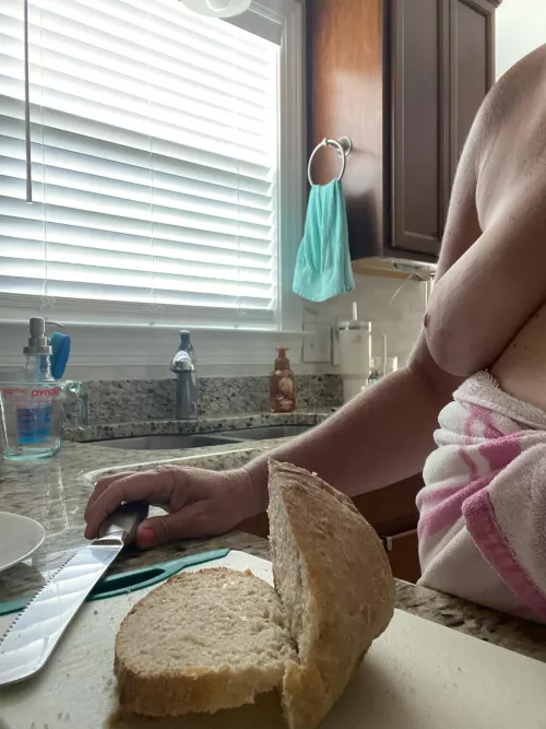 Cutting some bread by Jillneedalife