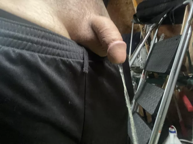 Pissing in the shed on a rainy day by KookyBeach5