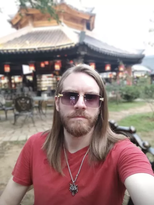 Traveling in Vietnam , behind me is a local restaurant. Peaceful place !  by HairyStranger1
