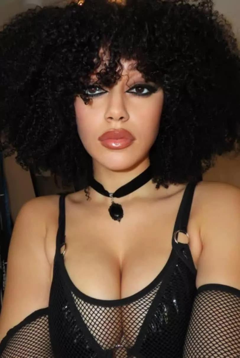 Dressed to impress in fishnet finesse. posted by Samiraxoxodarky