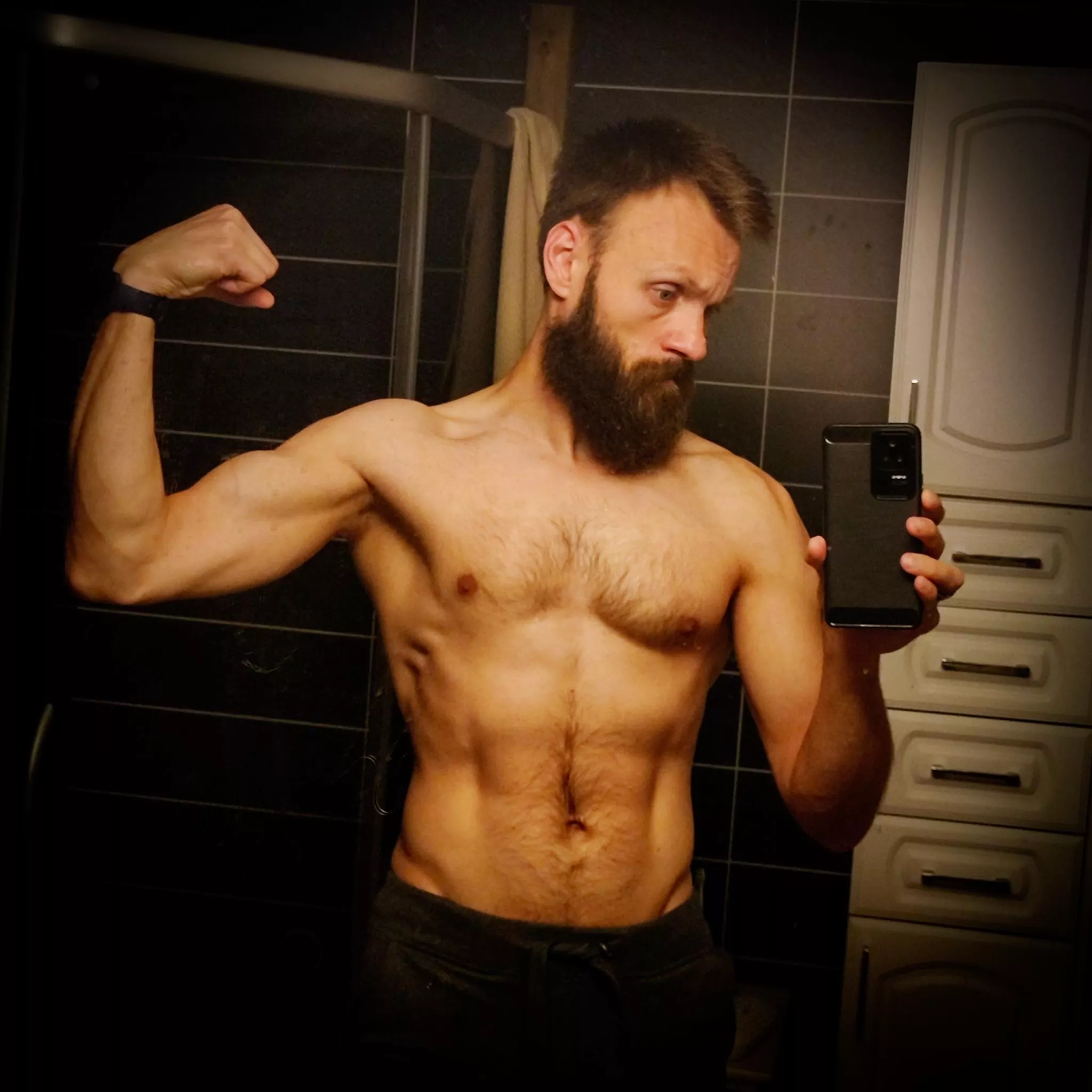 I just can't walk past mirror and not take a selfie 🤭. Who can relate? posted by BeardWoof1337