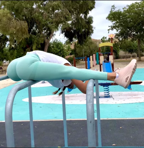 Stretching on the uneven bars by ms_twine_grace