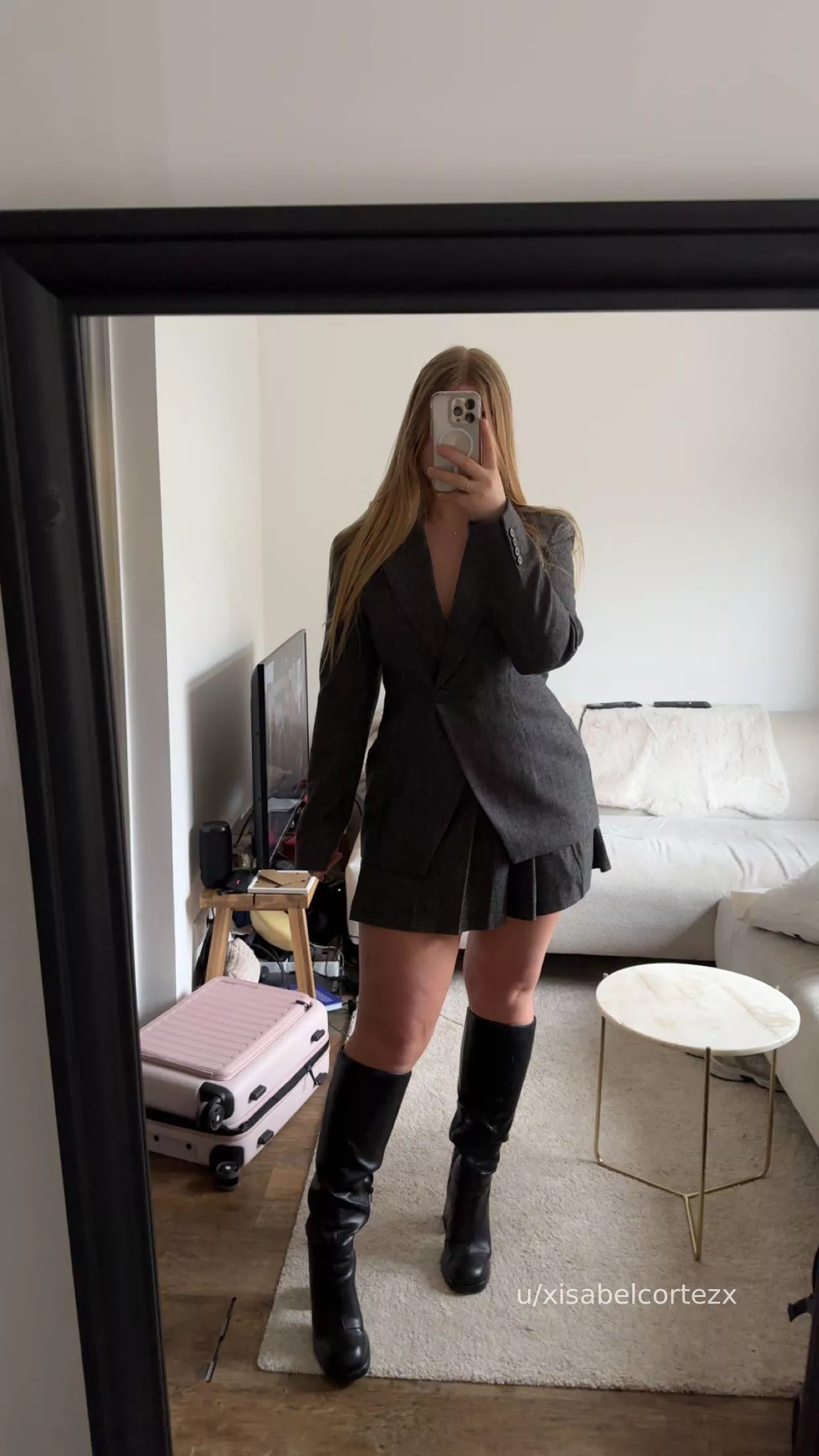 I like to wear leather boots under my office outfit posted by xisabelcortezx