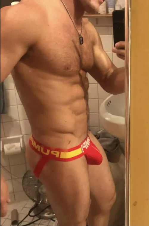 Fiery red jockstrap from PUMP! Like how it fits me? I'm a fiery man. by gayvittles