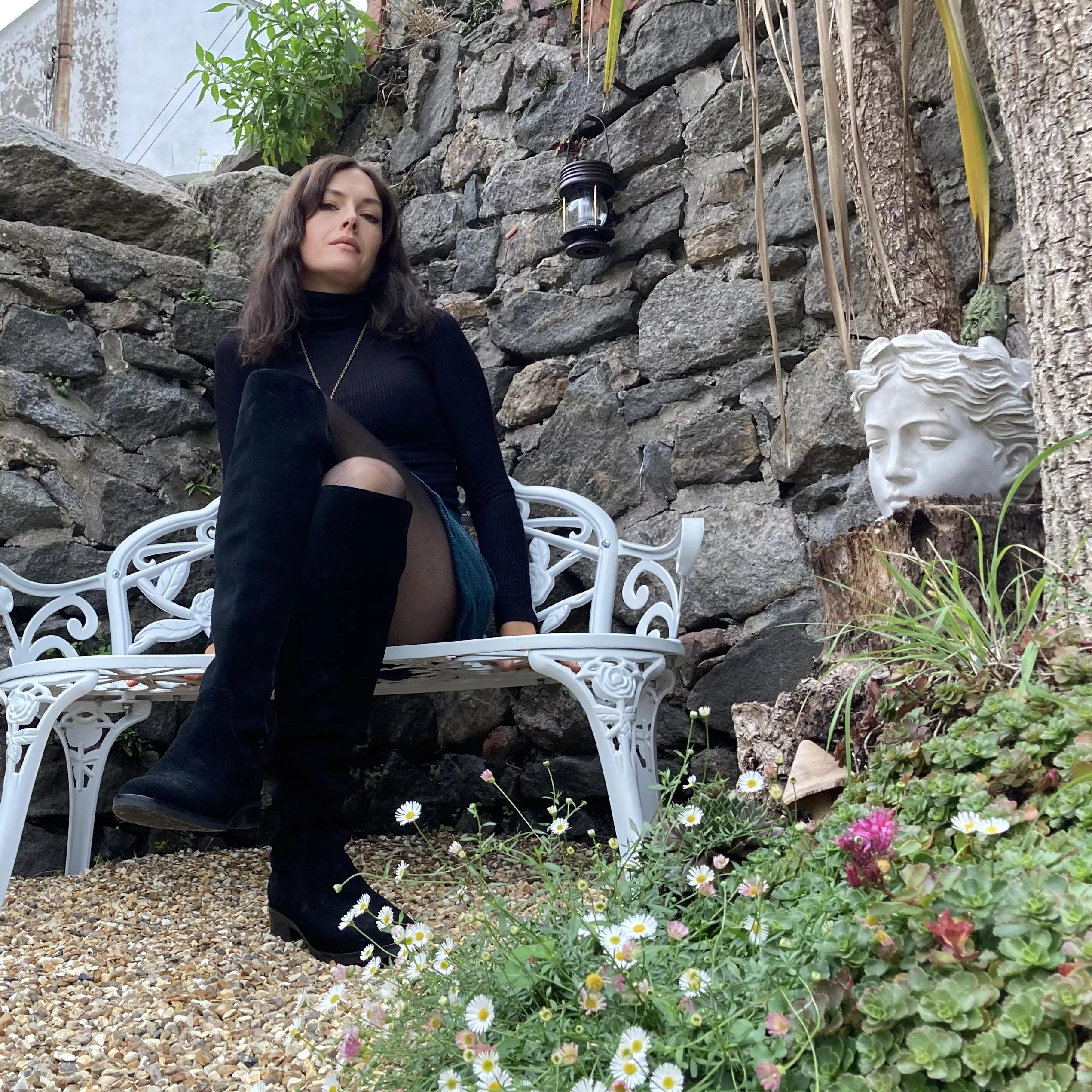 Knee high boots with stockings and a miniskirt posted by CulturalAd3010