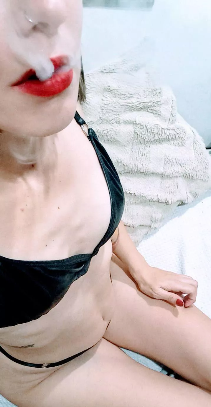 Playing with cigarette smoke 🔥 posted by evaanss_