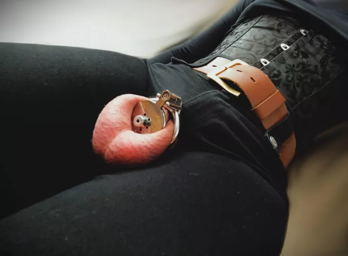 just relaxing with cage and corset on by Wonderful_Maybe_5146