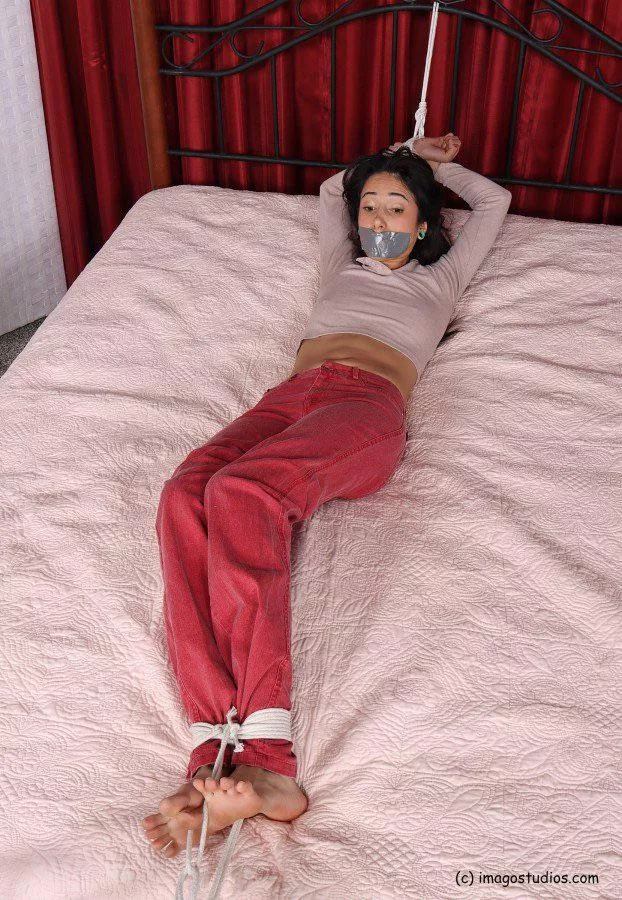 Tied to her bed posted by Icantthinkofaname567