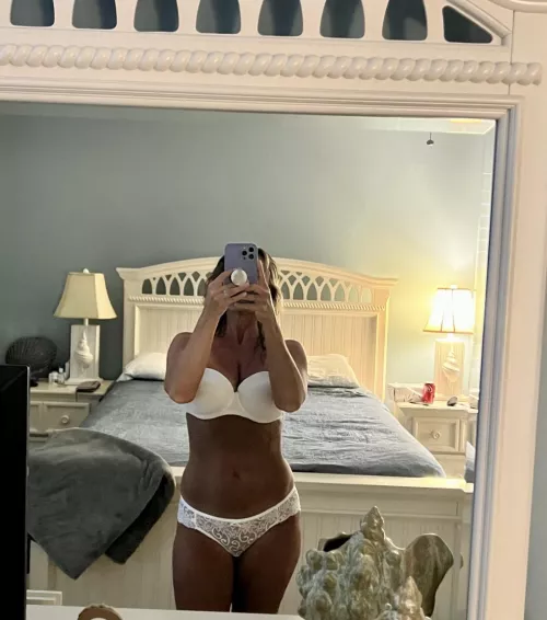 Liking the tan against the white panties and bra? by intrigued_wife