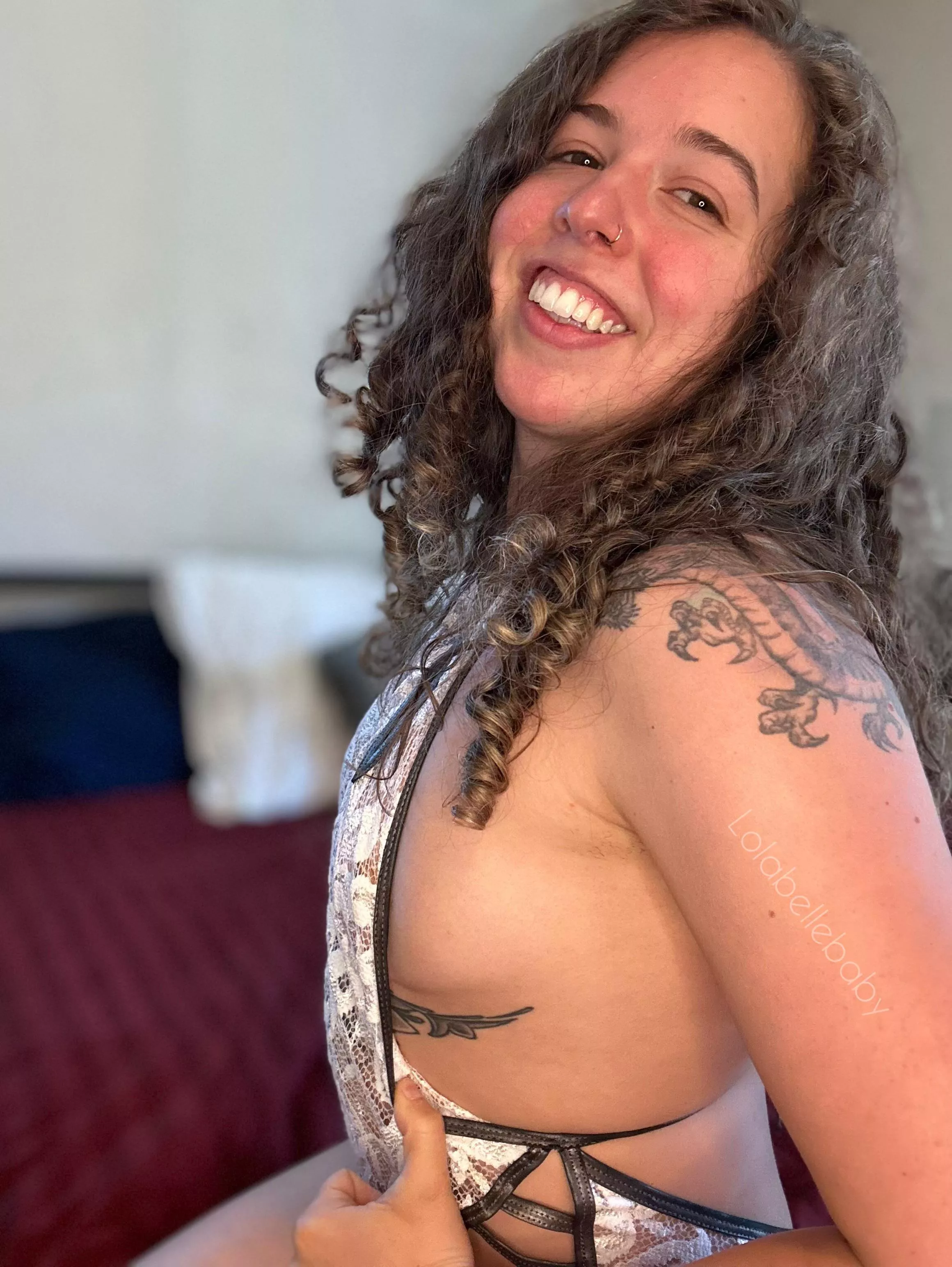 I love seeing my tattoo peek out 😜 posted by lolabellebaby