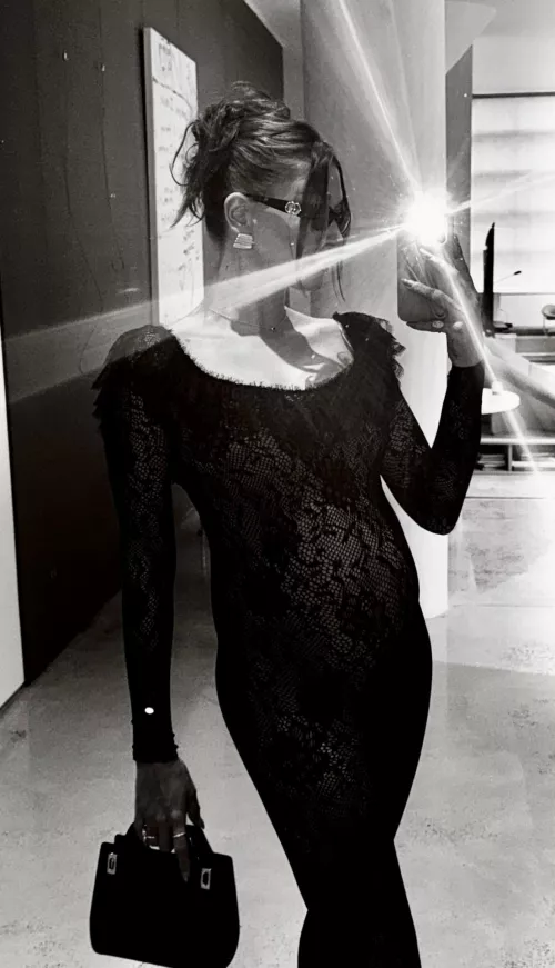 Pregnant Hailey Bieber in black dress  by ConsiderationOdd9871