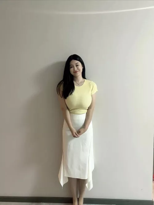 Asian in yellow shirt and white skirt by Desecr8or