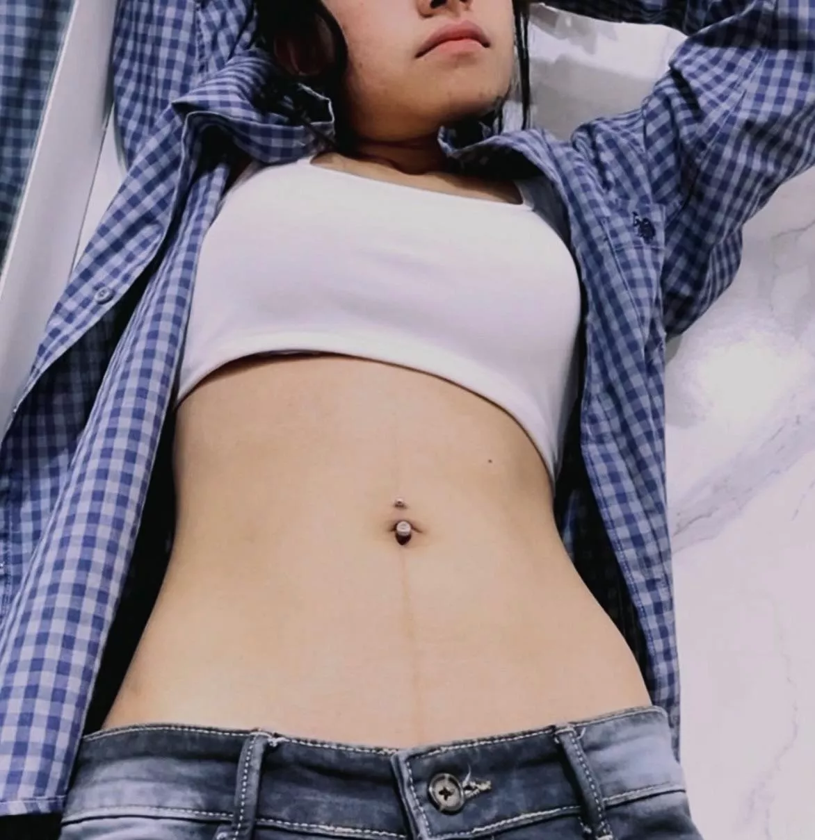 Pierced navel, low rise denim and toned midriff.. what else you need? 😉 posted by TheSlimWaistFitGirl