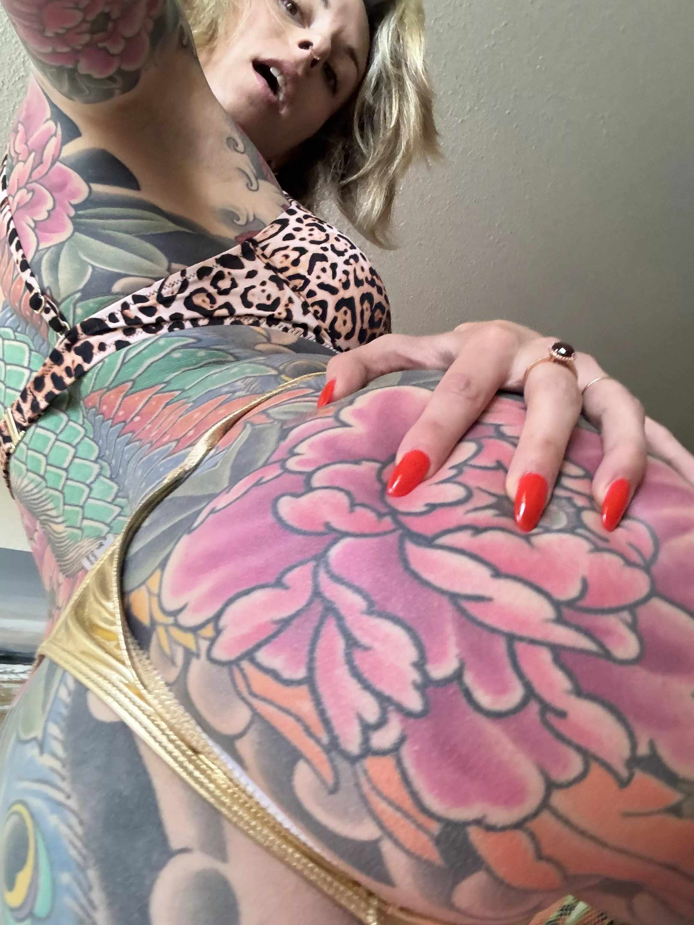 Red nails and tattoos  posted by kuzagirl