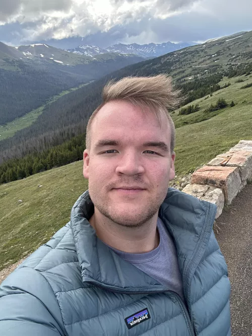 A man on a mountain by Photo_Nomad