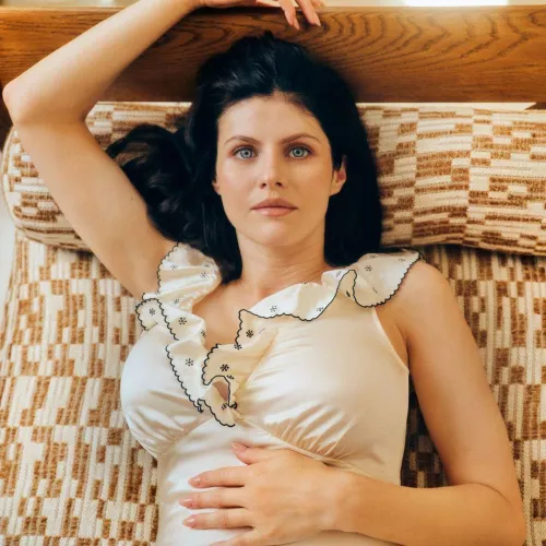 Alexandra Daddario laying down  by Earthling275