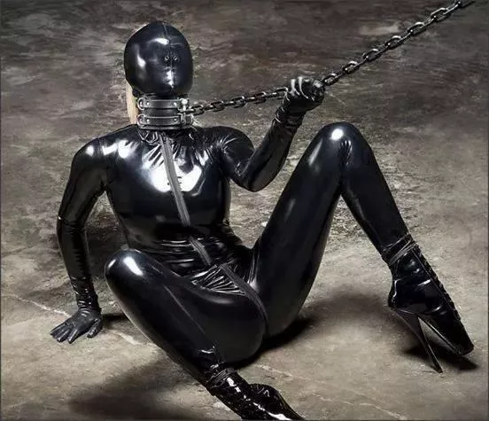 Blonde in Latex and Chained posted by DrRustyCage