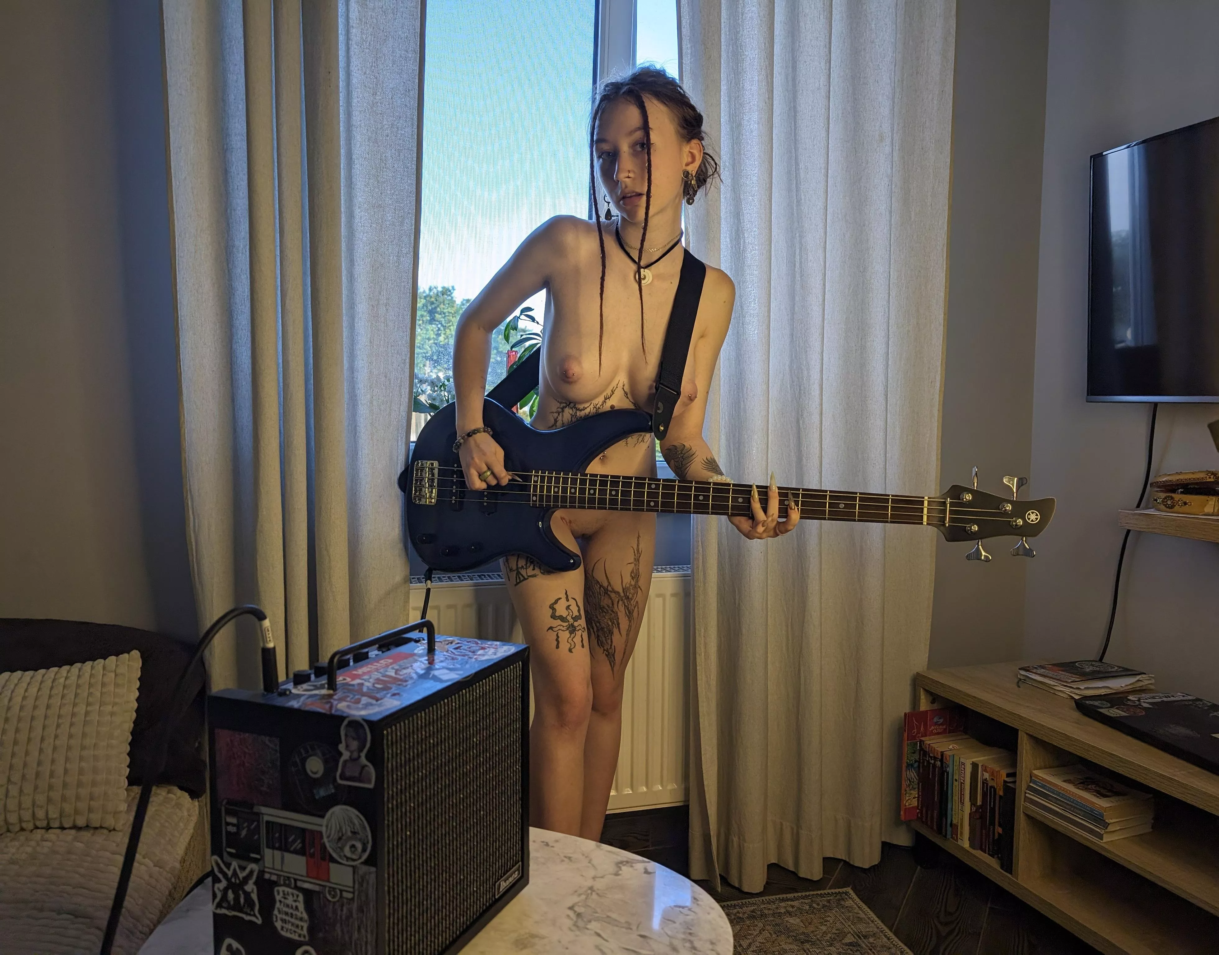 How much do piercings and tattoos turn you on? posted by Lordeniii