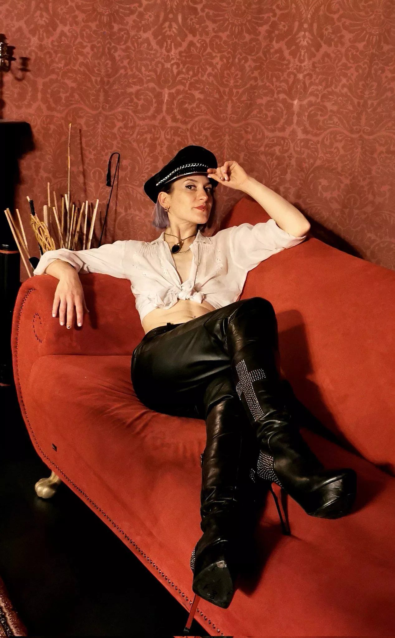 Relaxing on the couch in my knee high boots posted by MissFloraBerlin