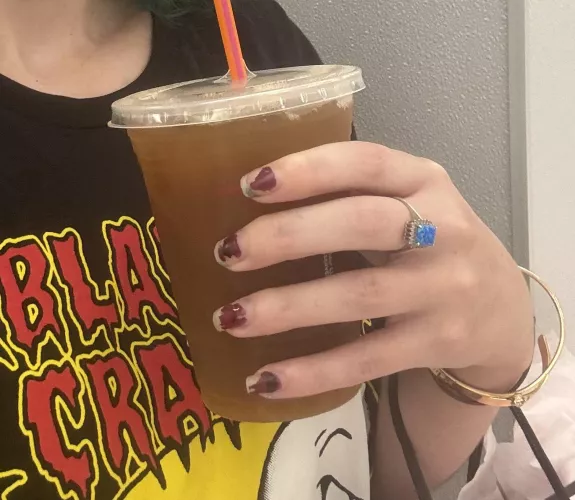 Hand holding a coffee by sirenskiss3