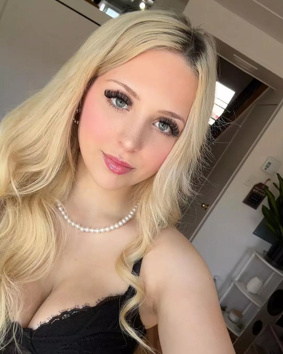 make up and black bra posted by SeducedByYourBeauty