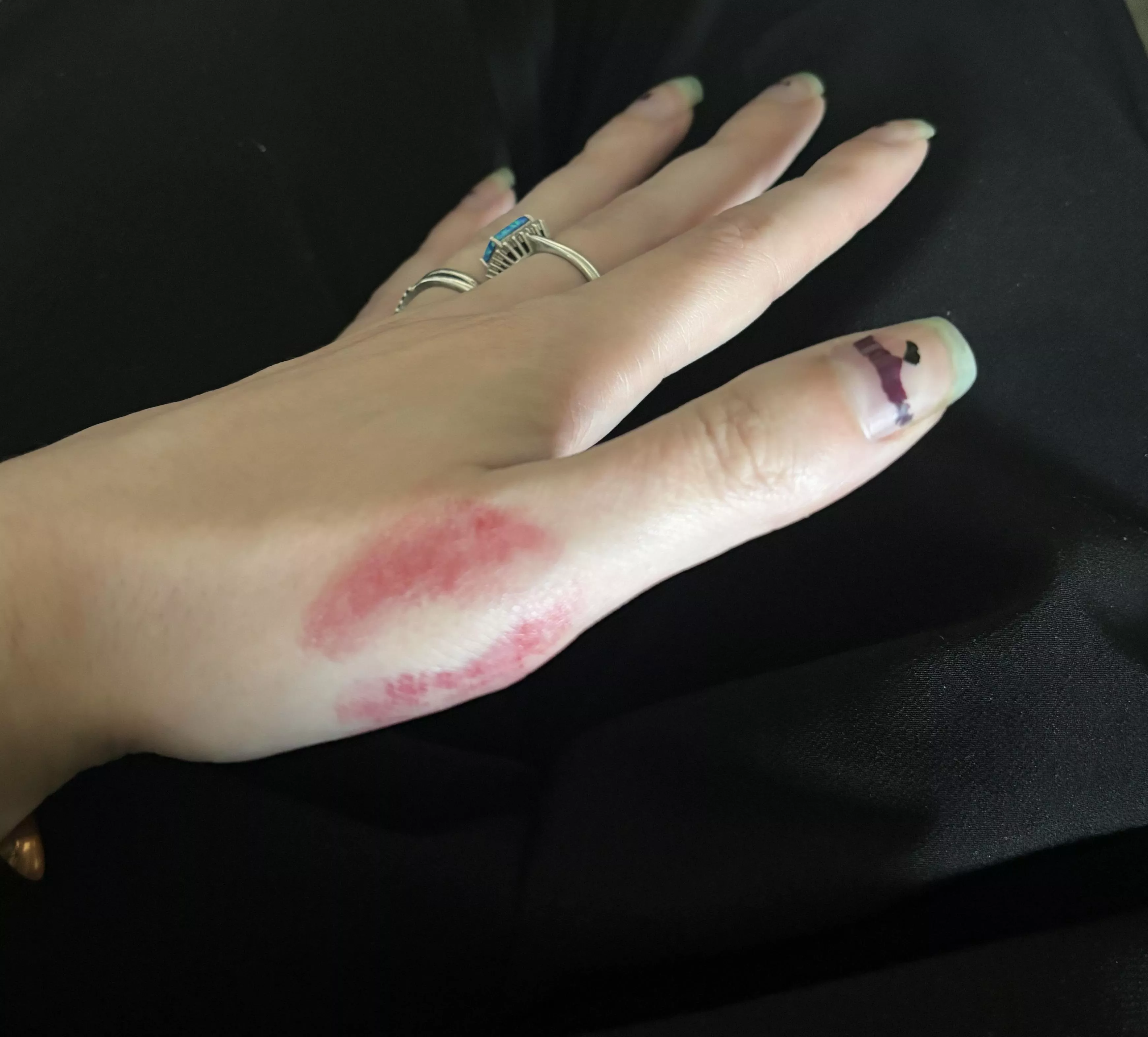 Hand with a lipstick kiss posted by sirenskiss3