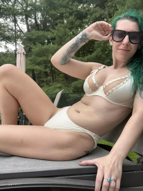 Neon on a lounge chair by sirenskiss3