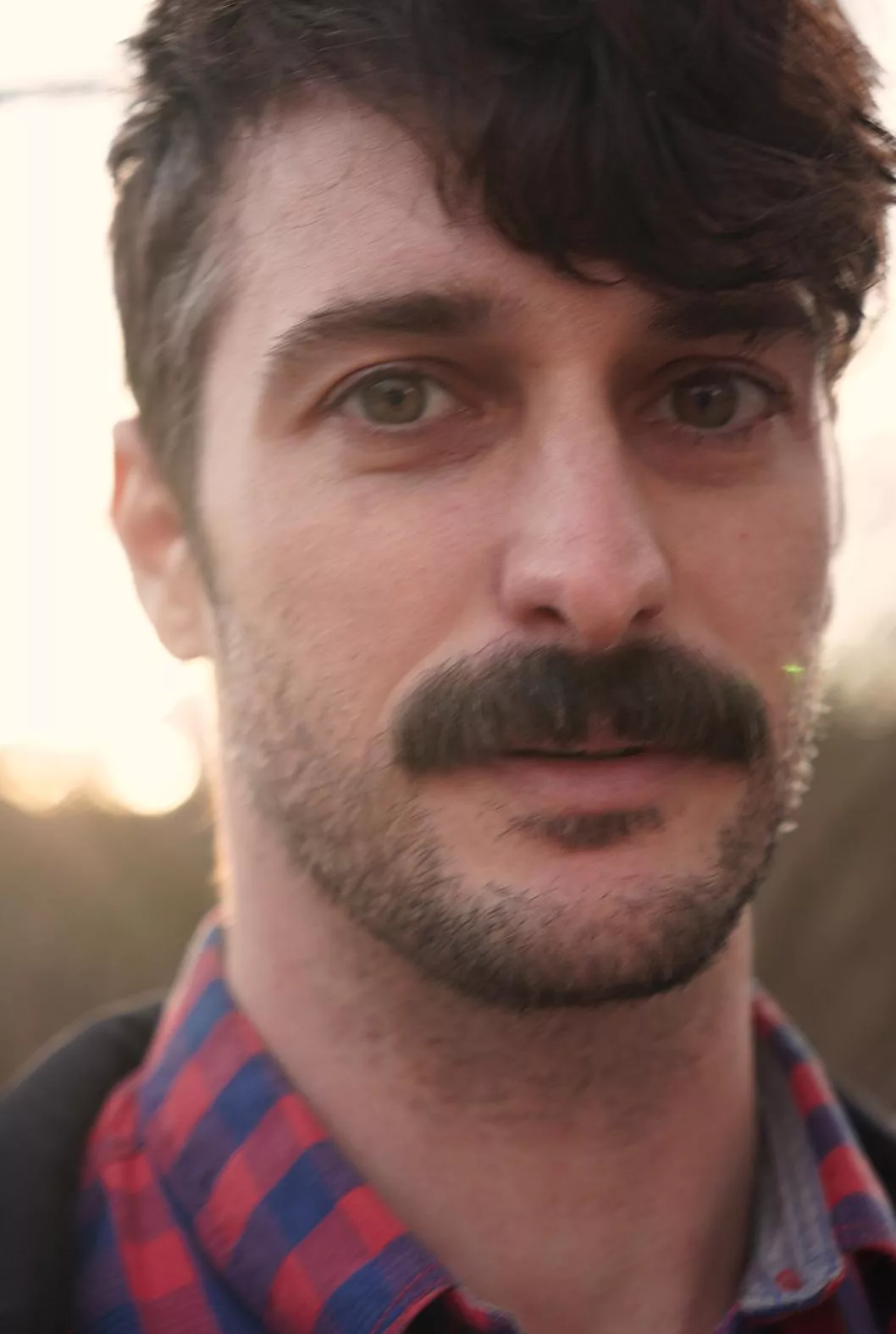 a bit blurry, but i like this random portrait of me taken by a friend :) posted by OutsideDrive9784