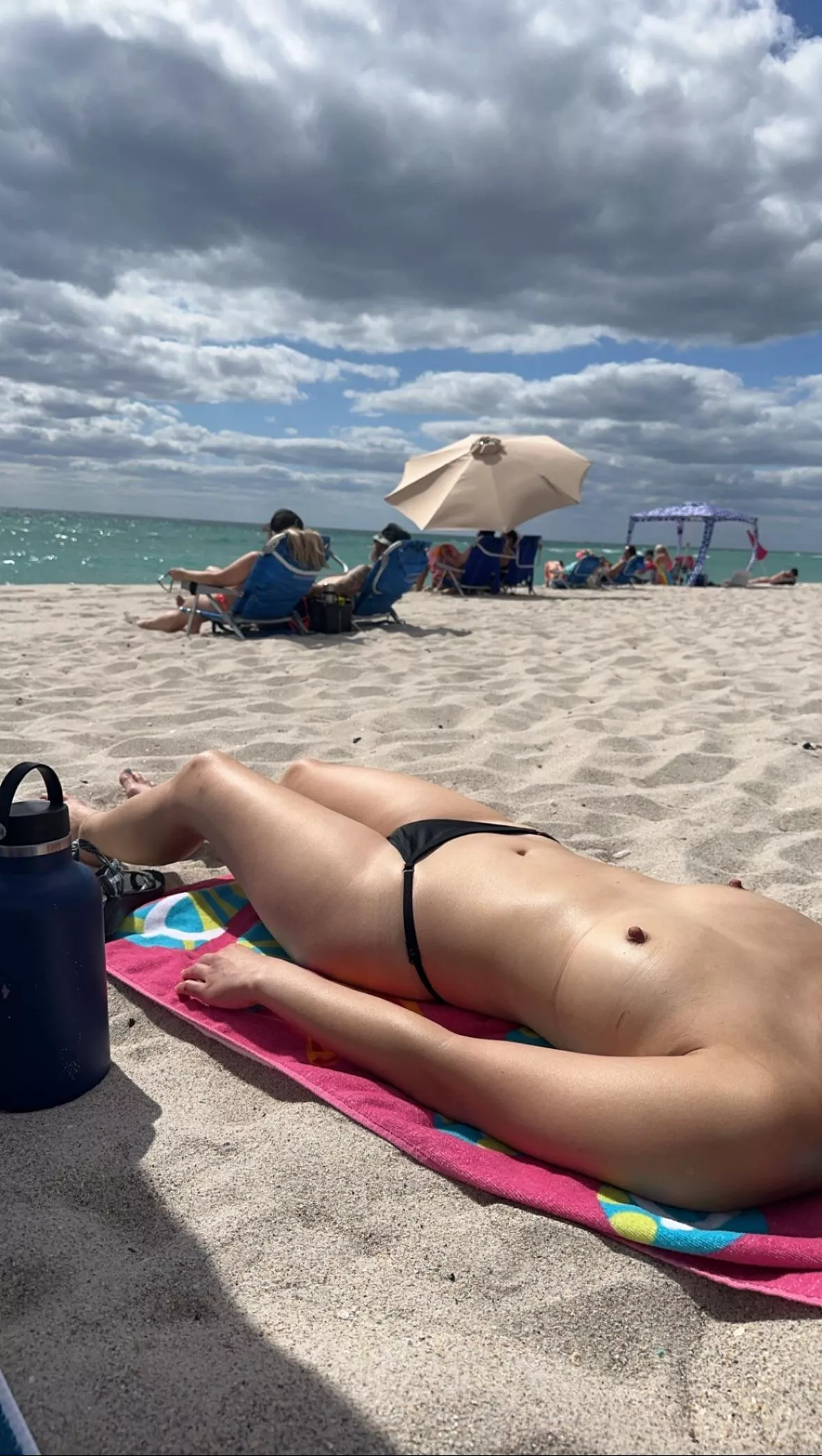 Tanning Topless at the Beach posted by Lickmy-