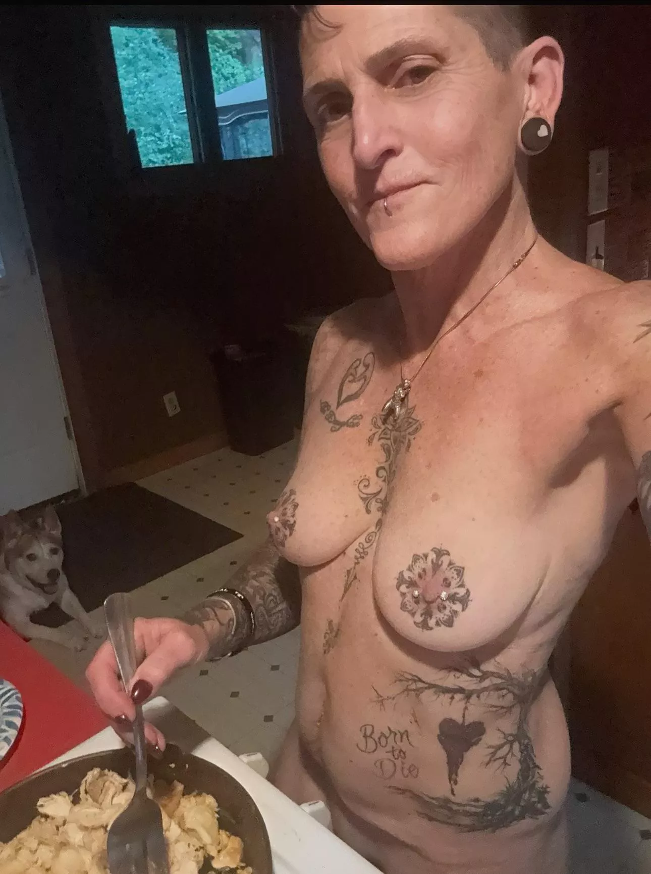 Getting dinner ready with my furry friend. posted by PaintedWoman_