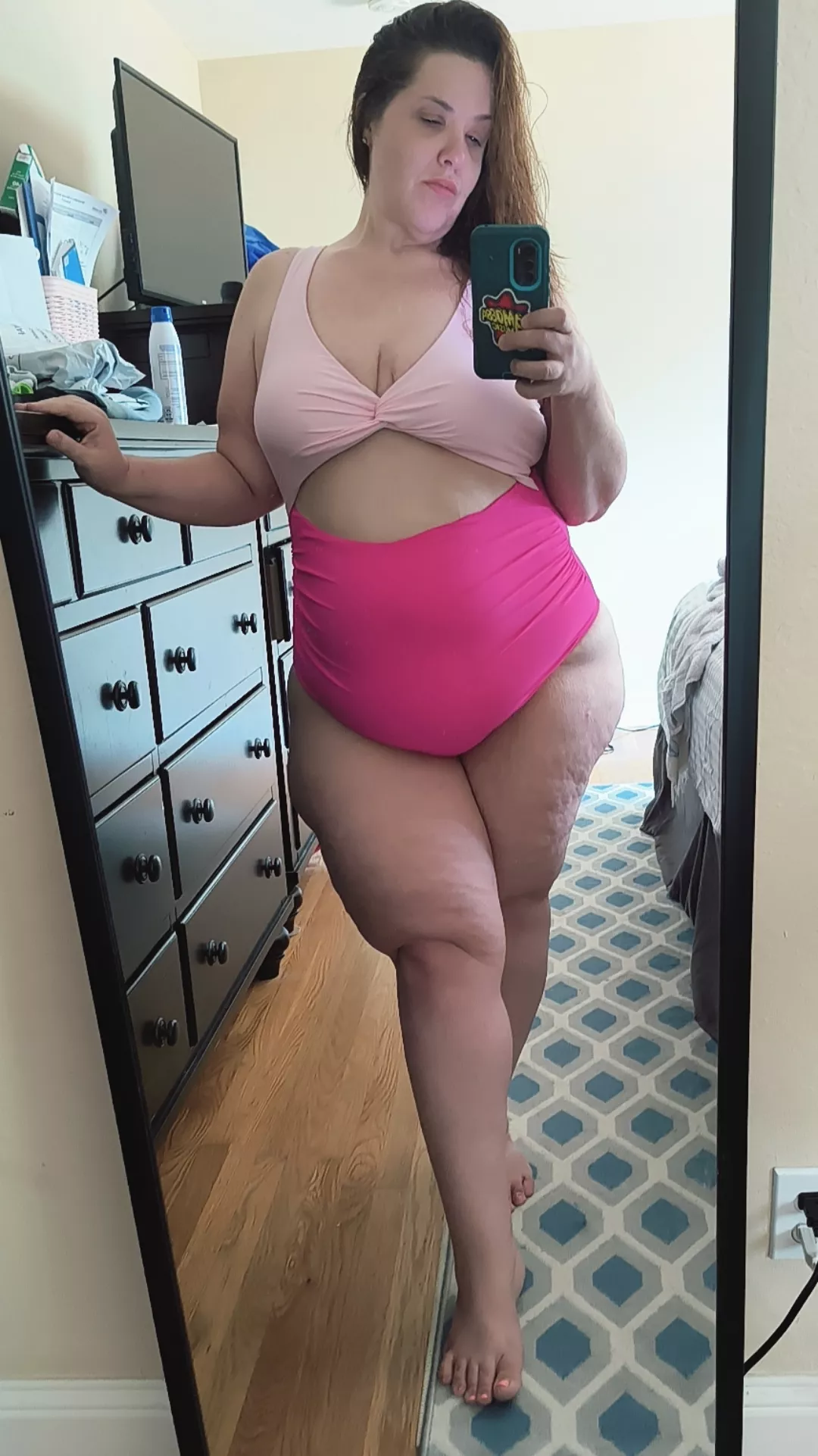 Not sure how I feel about this swimsuit. Love the color though!  posted by MissW0rld51