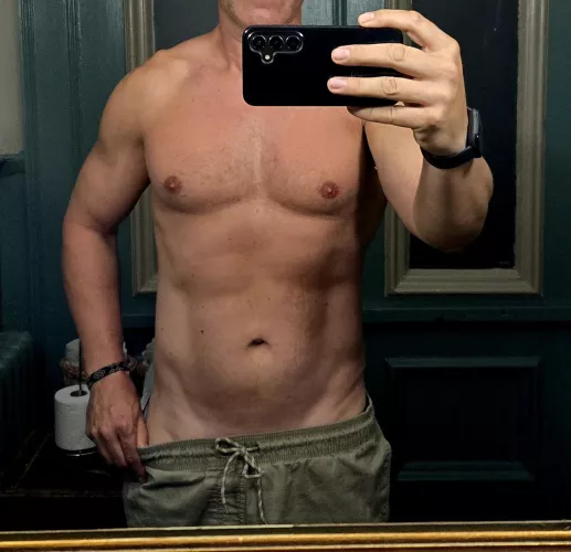 You're staying at a family friends house over summer break and one day you're left alone with the dilf of the house and you accidentally walk into his home office and see him like this what do you do? [48] by More_Present8862