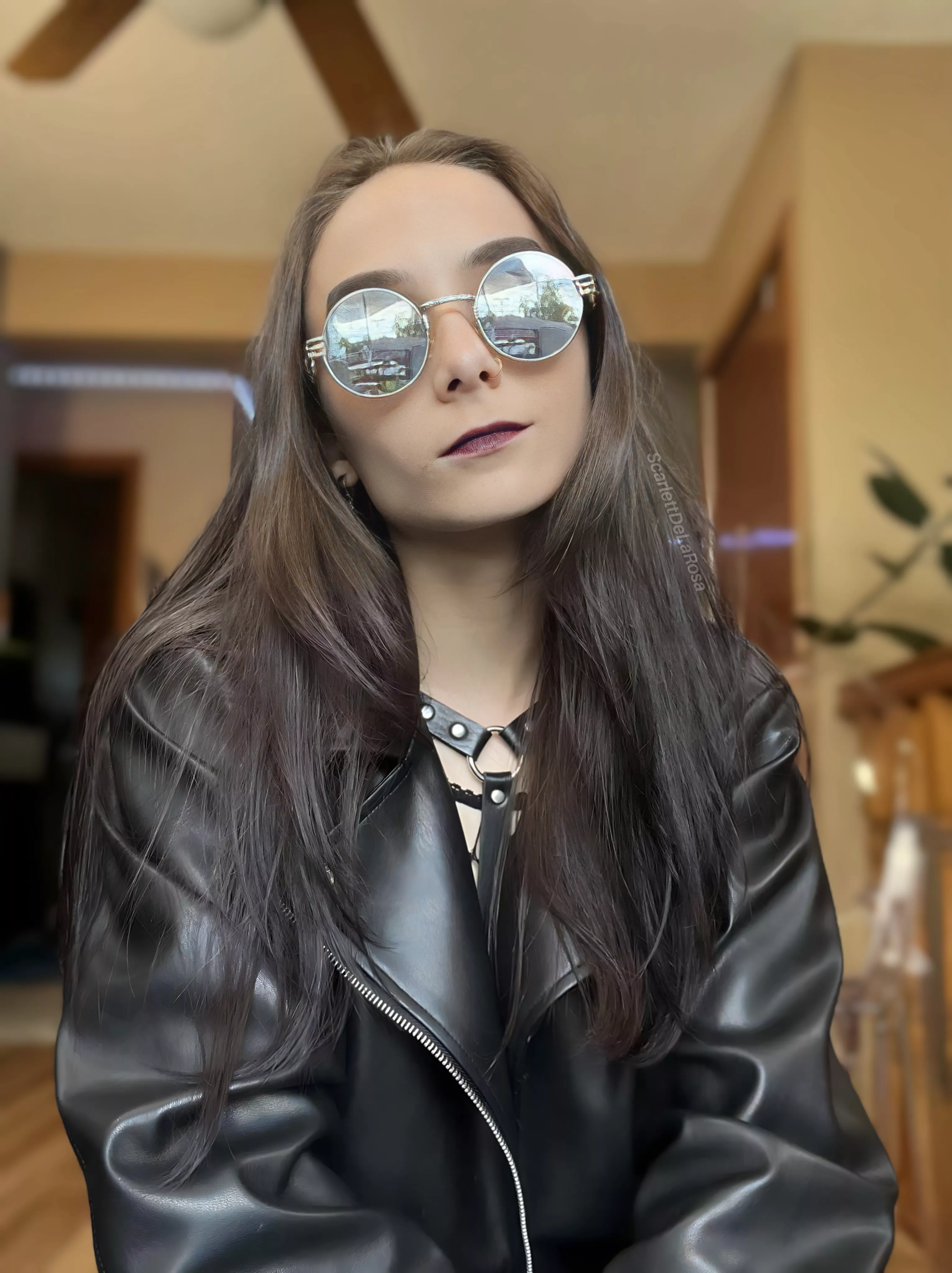 Can't go wrong with a leather jacket and harness posted by ScarlettDeLaRosa