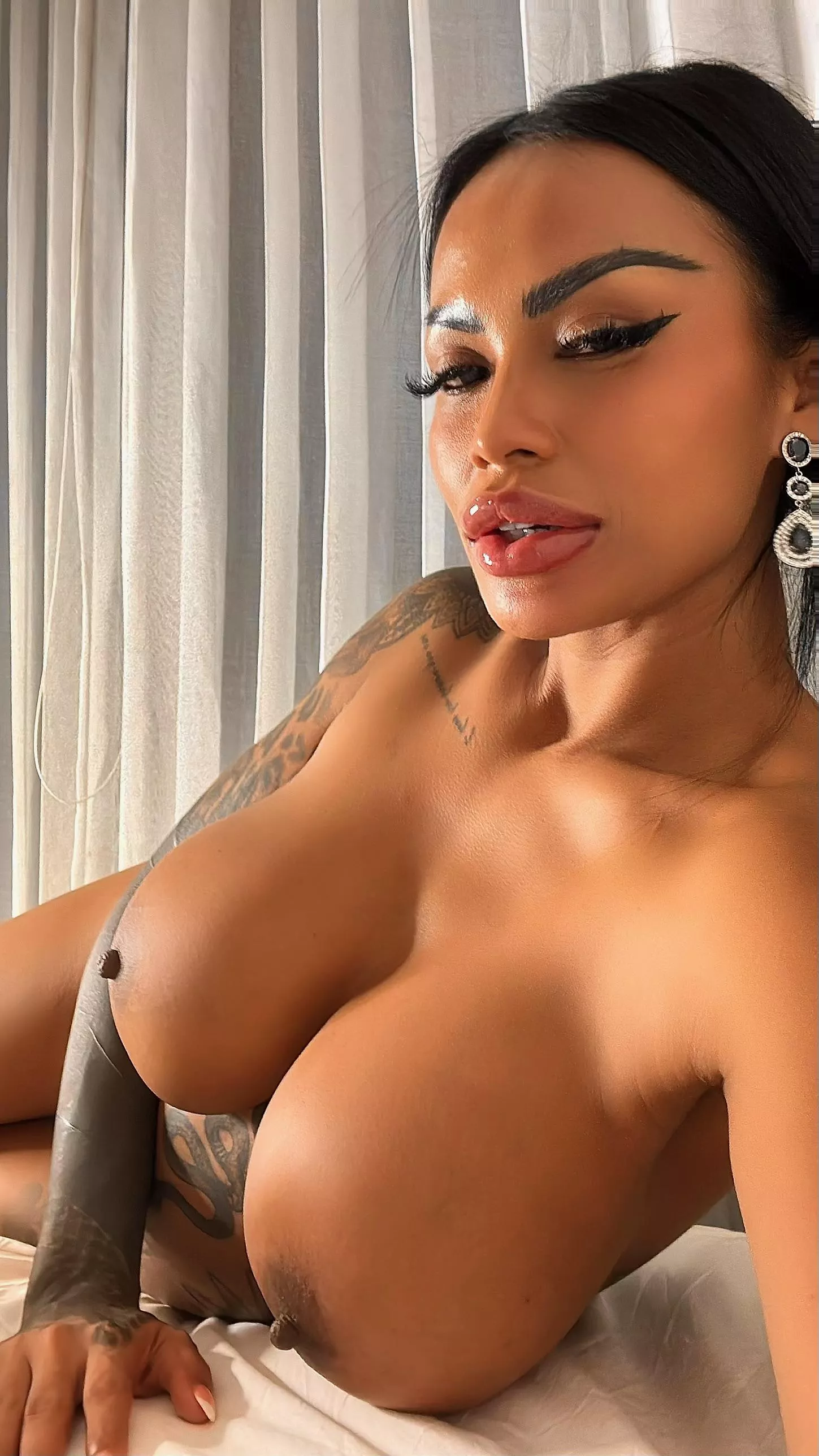 Describe my bimbo tits in 2 words if you can  posted by SerlianaElle