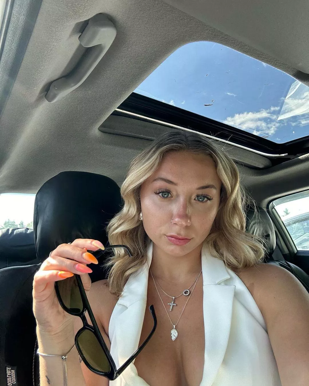 in the car posted by SeducedByYourBeauty