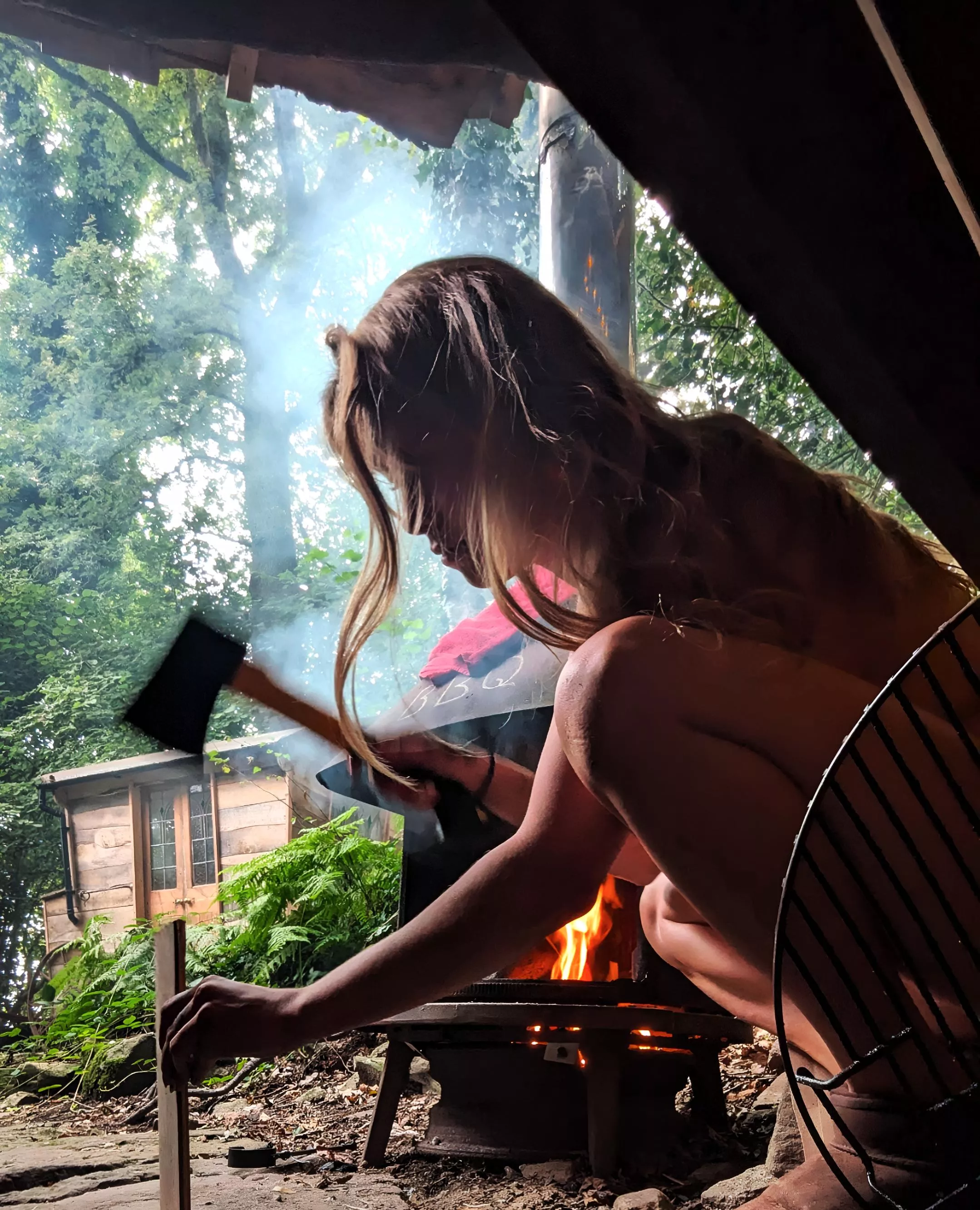 Axeing wood for the cabin 🙏🏼🔥 posted by MagicForestNymph